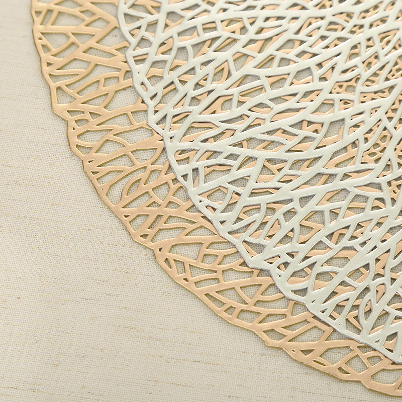 Wholesale of new Japanese-style creative leaf-shaped hollowed-out placemats, pvc material round solid color Western placemats, coasters and table MATS Application Scenario
