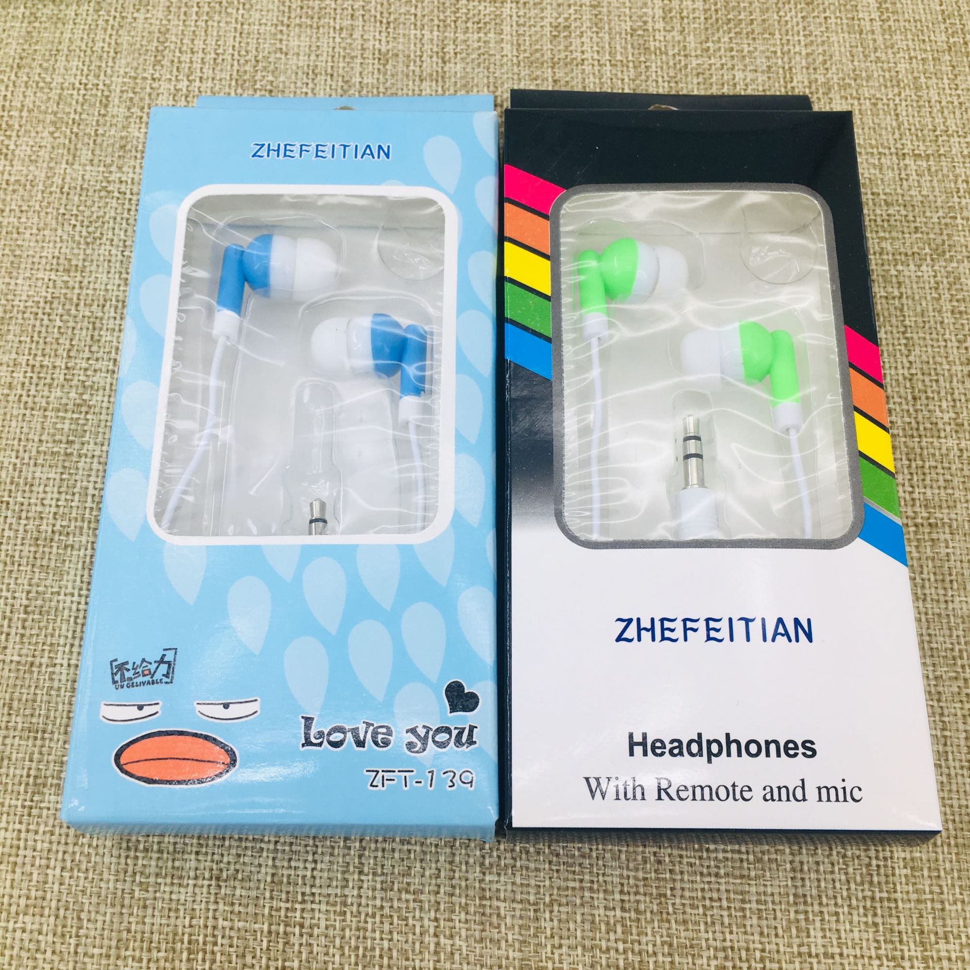 Wholesale store of mobile phone earphones in paper boxes, candy-colored in-ear MP3 earphones and computer accessories for two yuan details Picture