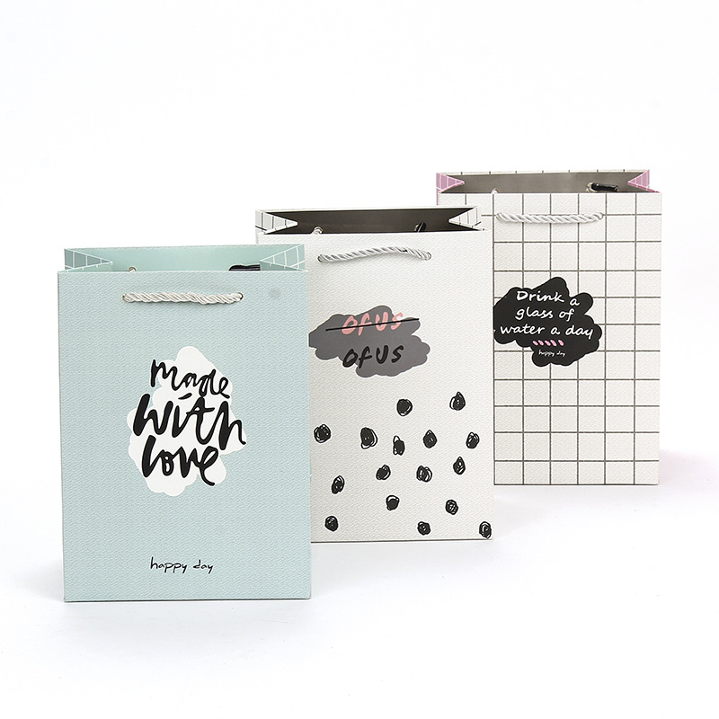 New spot cartoon gift handbag creative shopping clothing bag white card paper general paper bag wholesale