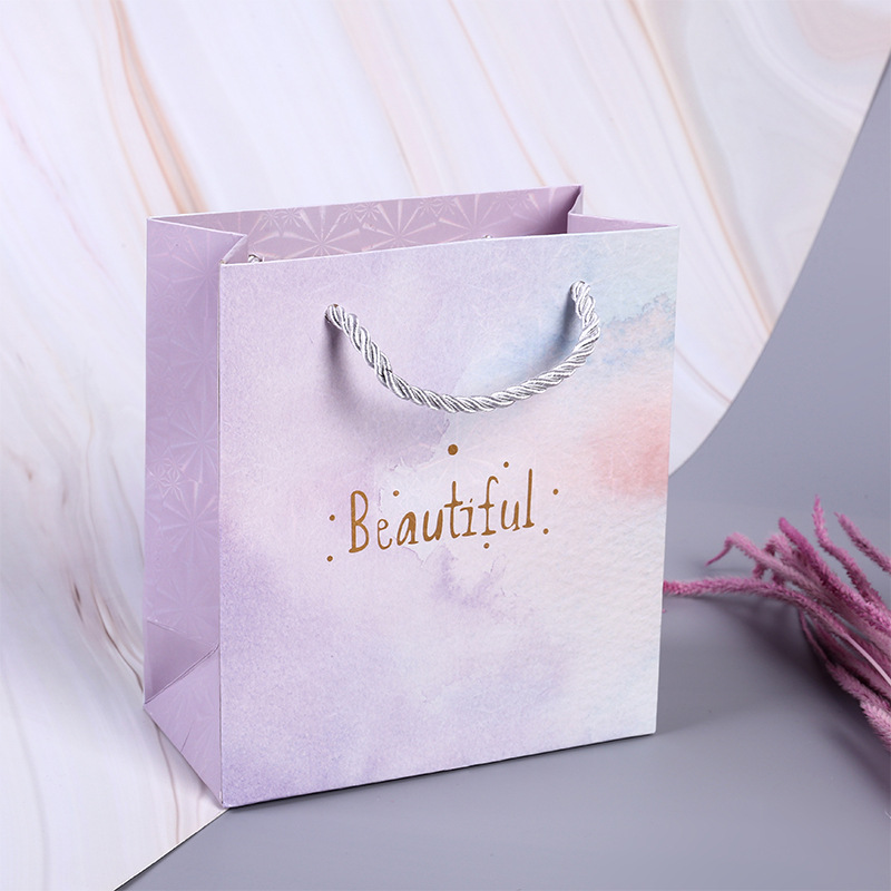 New paper handbag custom clothing paper bag enterprise advertising gift shopping bag clothing store logo