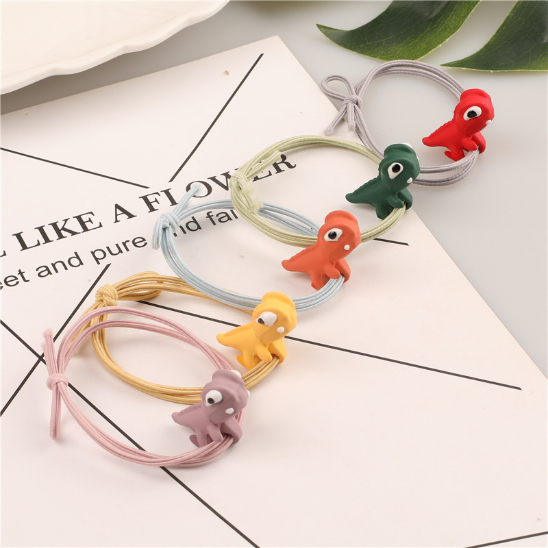 Wholesale supply of Korean cartoon threading three-dimensional dinosaur hair bands, high-elasticity hair tie rubber bands, and King Dragon hair ropes