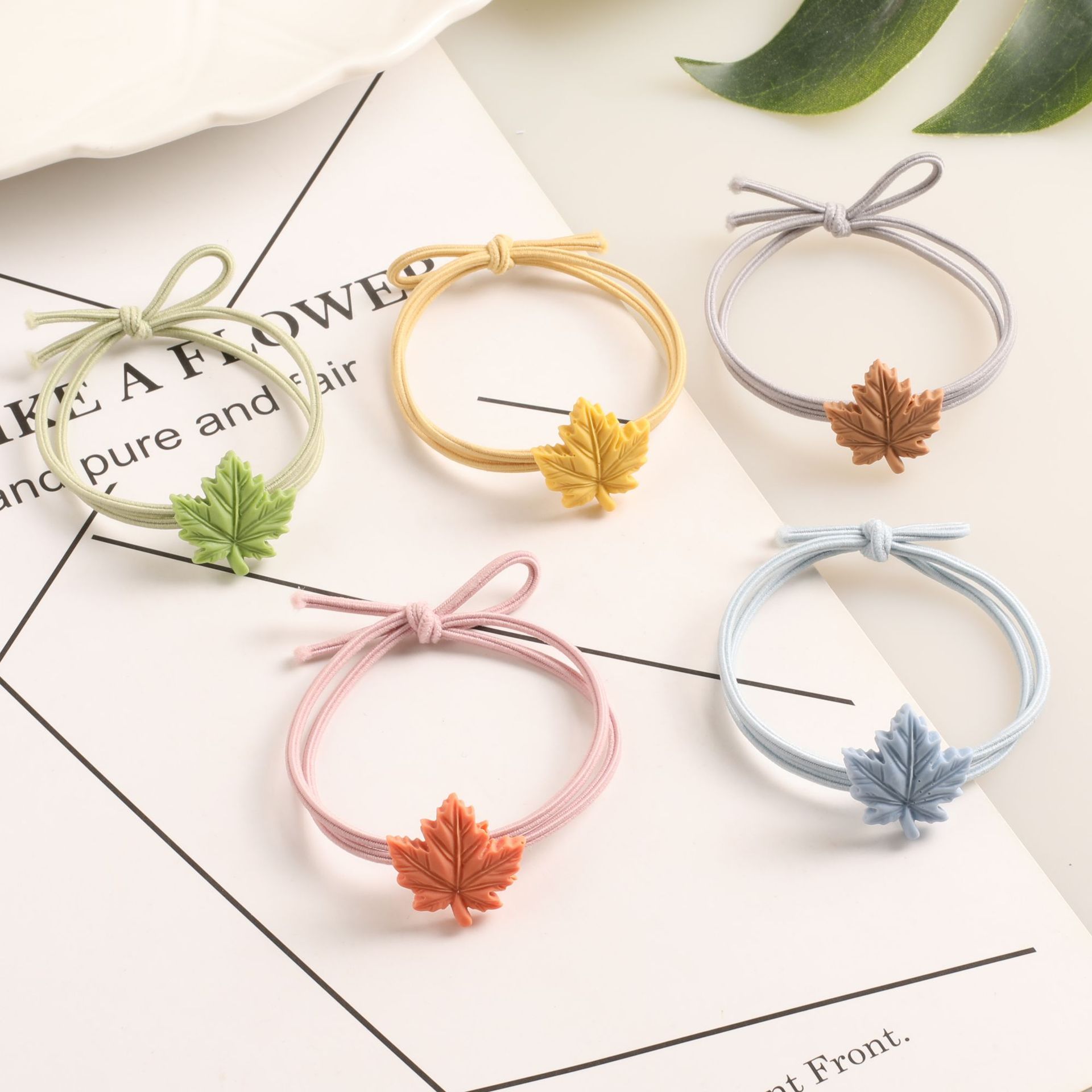 Korean version of simple leaf scrunchie cartoon leaf lady head tie hair high elastic rubber band Yiwu wholesale supply thumbnail
