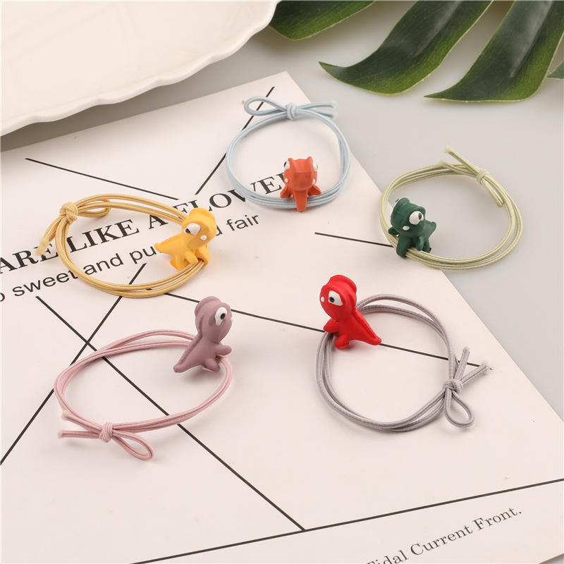 Wholesale supply of Korean cartoon threading three-dimensional dinosaur hair bands, high-elasticity hair tie rubber bands, and King Dragon hair ropes details Picture