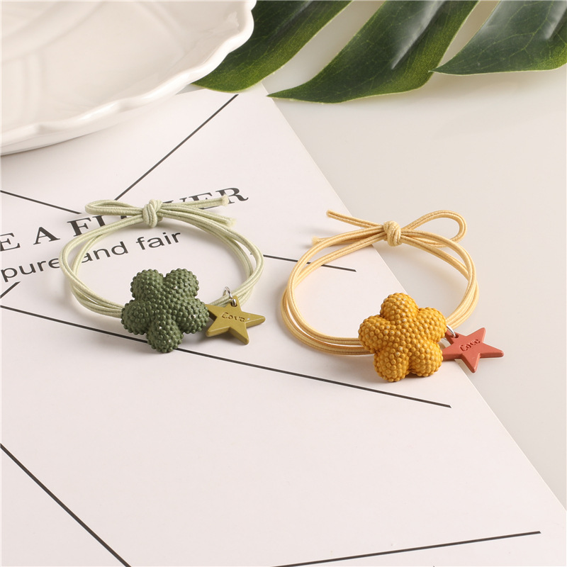 Korean style Instagram popular hair tie, creative cartoon five-pointed star flower hair band, hair tie rubber band, high-elasticity hair tie Application Scenario