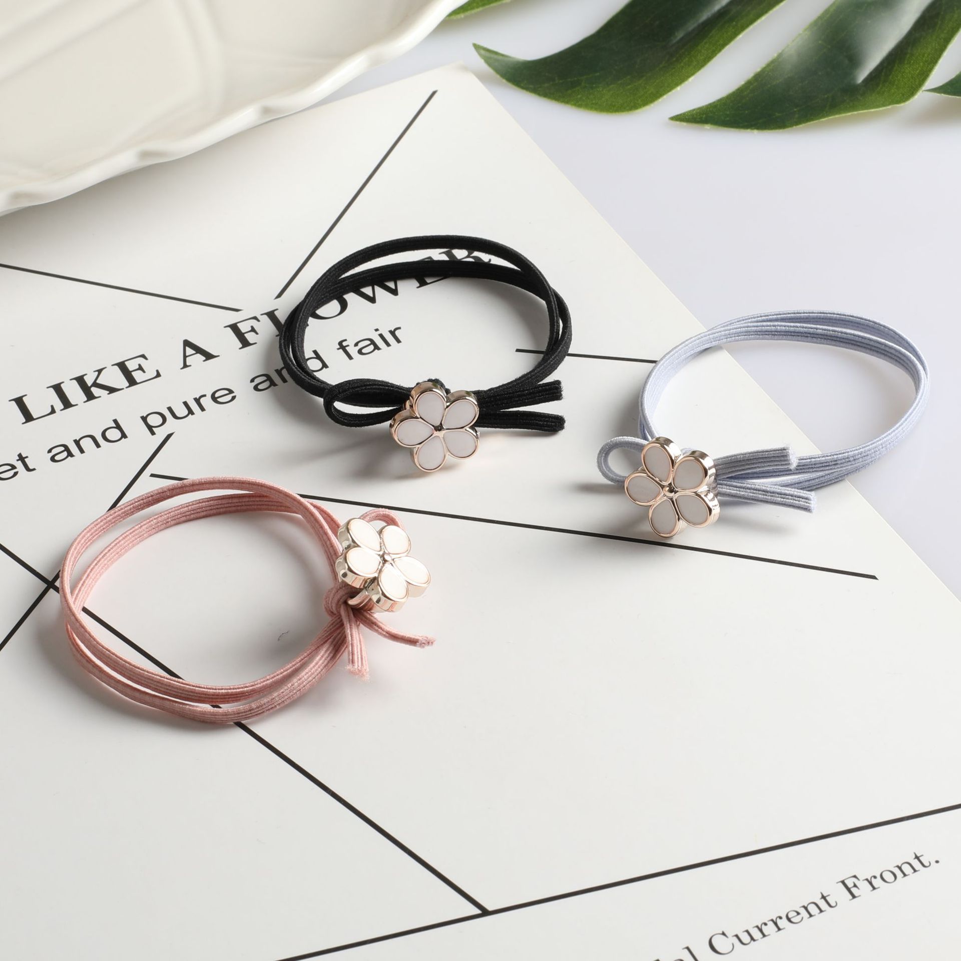 Korean version simple five-petal flower hair band, popular hair tie, flower hair tie, women's hair tie, rubber band wholesale supply in Yiwu Specification image