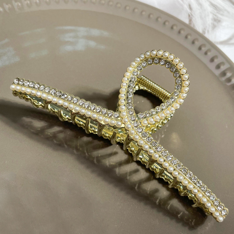 New bow tie diamond pearl clip, five-pointed star head back spoon hair claw, large crown hair clip, metal fashionable hair clip Item Picture