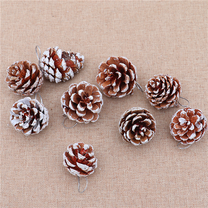 Christmas tree ornaments with pine cones dyed white and painted Christmas tree hangers