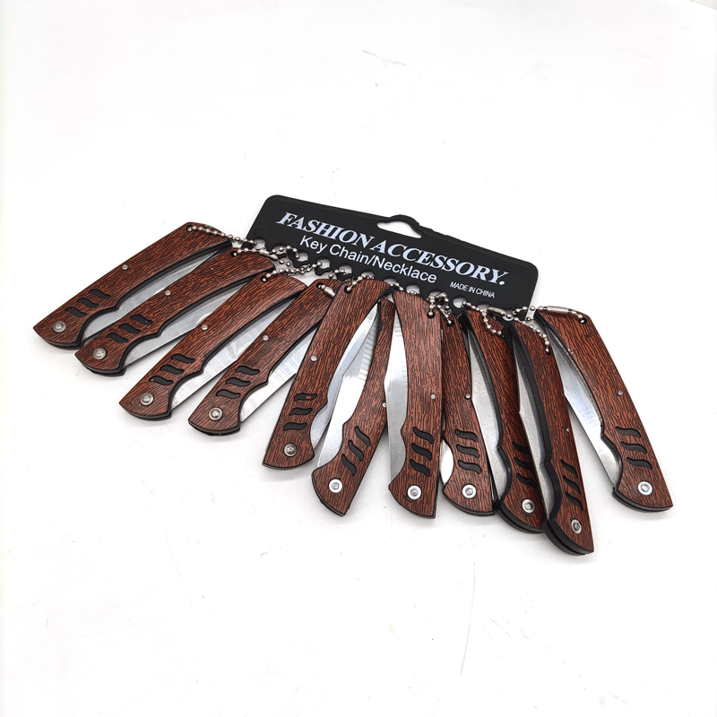 Two-yuan store wood-grain fruit knife, household foldable knife for peeling potatoes, portable wooden handle knife wholesale details Picture