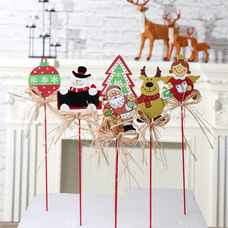 A Christmas tag, a Christmas gift, an Old man, a snowman, a deer, an angel, a Christmas tree ornament, a small trinket