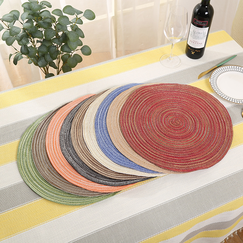 Modern and simple cotton yarn woven round characteristic Western placemats, heat insulation pads, household anti-slip and heat-resistant coasters wholesale full figure