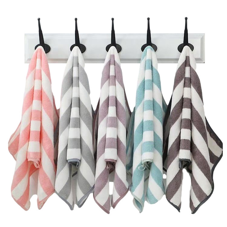 A best-selling household coral fleece absorbent large towel wrap for both men and women, soft and shedding bath towel Item Picture