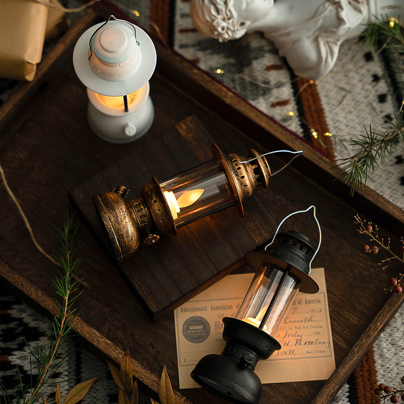 Christmas retro glowing electronic candles, swaying wind lanterns, table ornaments, Halloween oil lanterns, scene decoration and arrangement details Picture