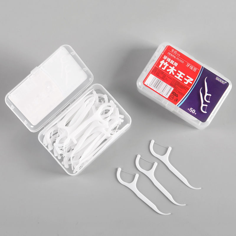 The manufacturer offers wholesale of disposable household floss and toothpicks, 50-piece fine floss sticks, toothpicks and floss in boxes details Picture