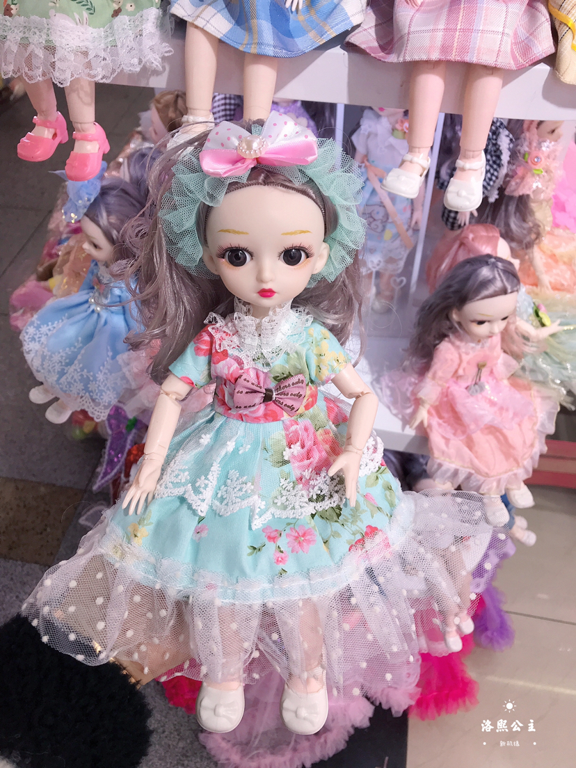 دمية "باربي" الموسيقية من مجموعة الأزياء التي تبلغ مقاسها 12 بوصة والطراز 30 CM Item Picture