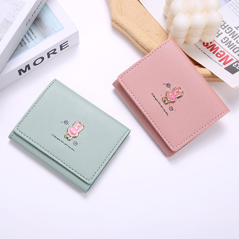 ins nueva versión coreana de la cartera de las mujeres corto versátil estudiante clip de dinero de las mujeres tarjeta bolso triple fold cero billetera Specification image