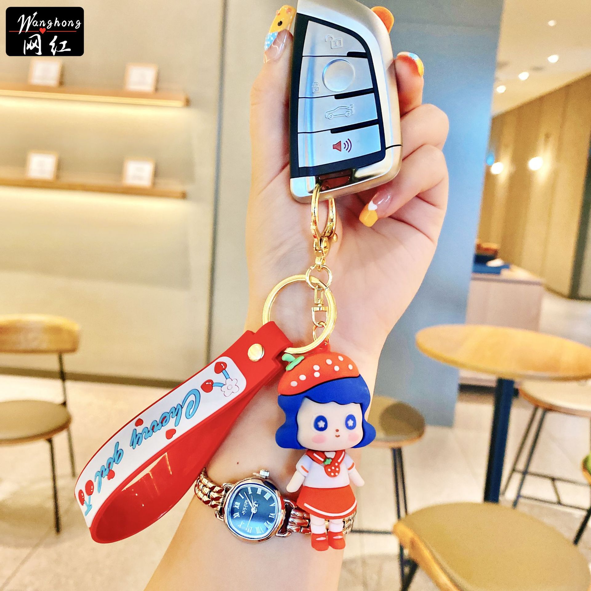 Wholesale of cartoon strawberry couple keychains, creative epoxy resin figurines, car key chains, accessories, cute bags and pendants details Picture