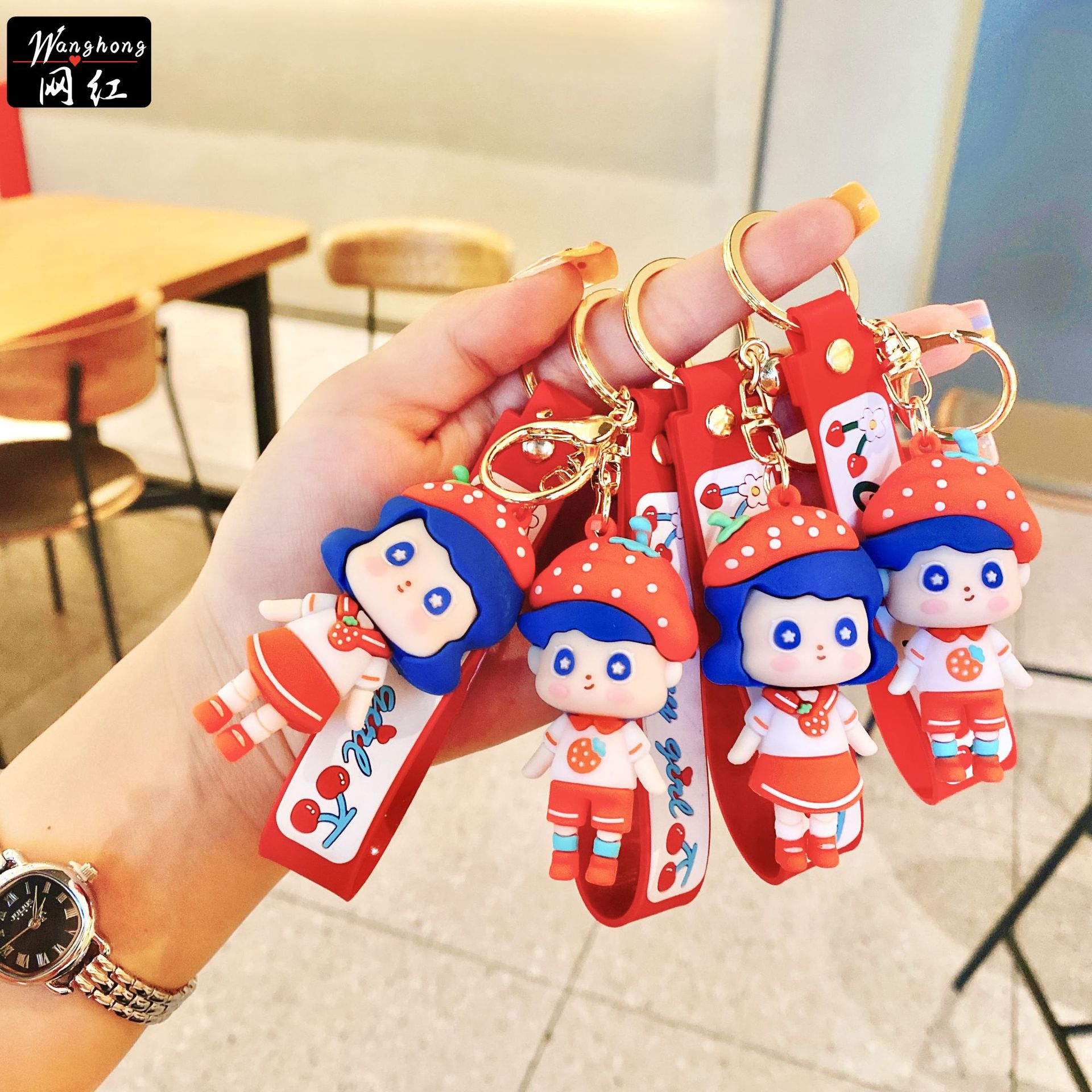 Wholesale of cartoon strawberry couple keychains, creative epoxy resin figurines, car key chains, accessories, cute bags and pendants Application Scenario