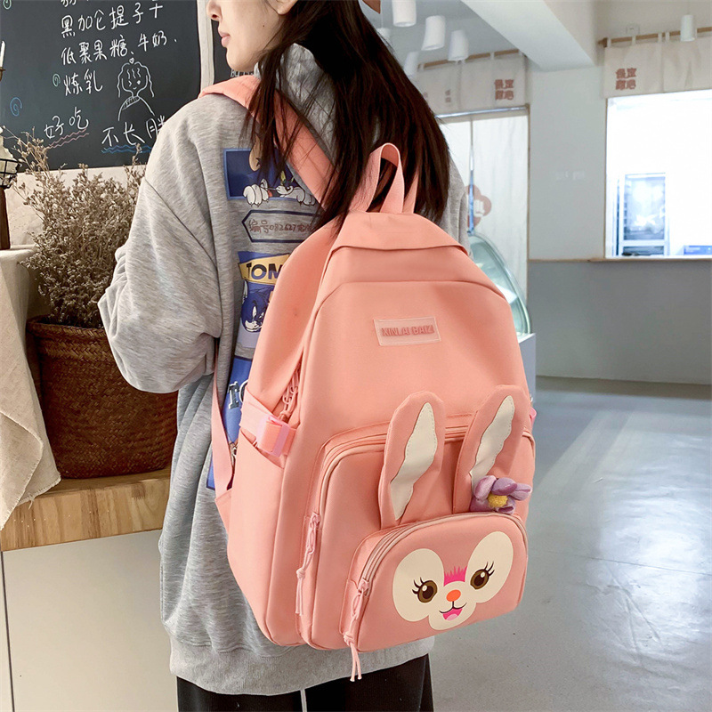 Linda mochila portátil de varias piezas nueva mochila de escuela primaria portátil mochila casual para niños mochila de gran capacidad