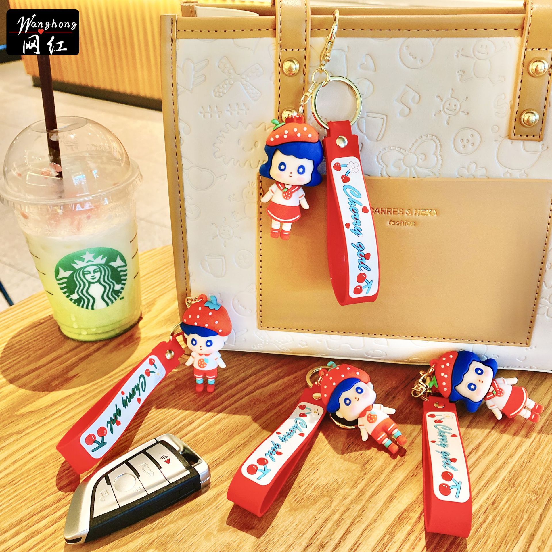 Wholesale of cartoon strawberry couple keychains, creative epoxy resin figurines, car key chains, accessories, cute bags and pendants Specification image