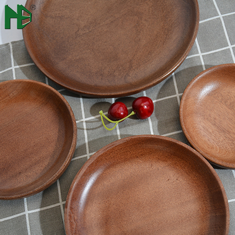 Wooden round black walnut wooden trays, fruit bread plates, baby dinner plates in various sizes are available for wholesale Specification image