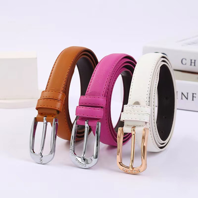 The trendy women's belt is simple and versatile, with a leather bottom and alloy pin buckle. The small apple women's belt manufacturer is selling it in stock details Picture