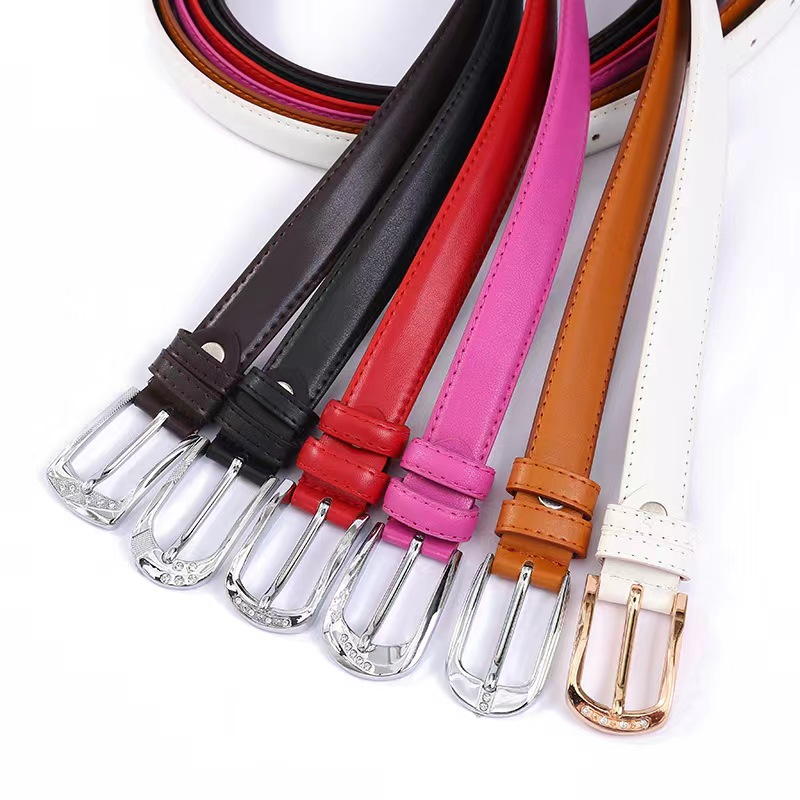 The trendy women's belt is simple and versatile, with a leather bottom and alloy pin buckle. The small apple women's belt manufacturer is selling it in stock