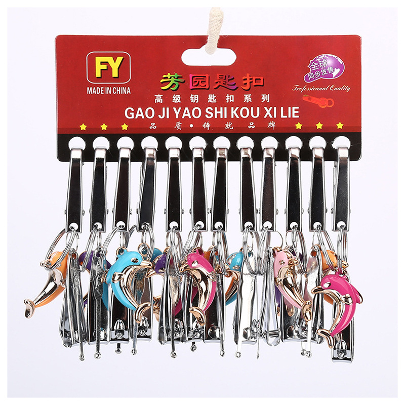 A 2-yuan store is selling hot nail clippers, cartoon metal, stainless steel nail clippers, ear spoons and keychains in 12-piece sets for wholesale Item Picture