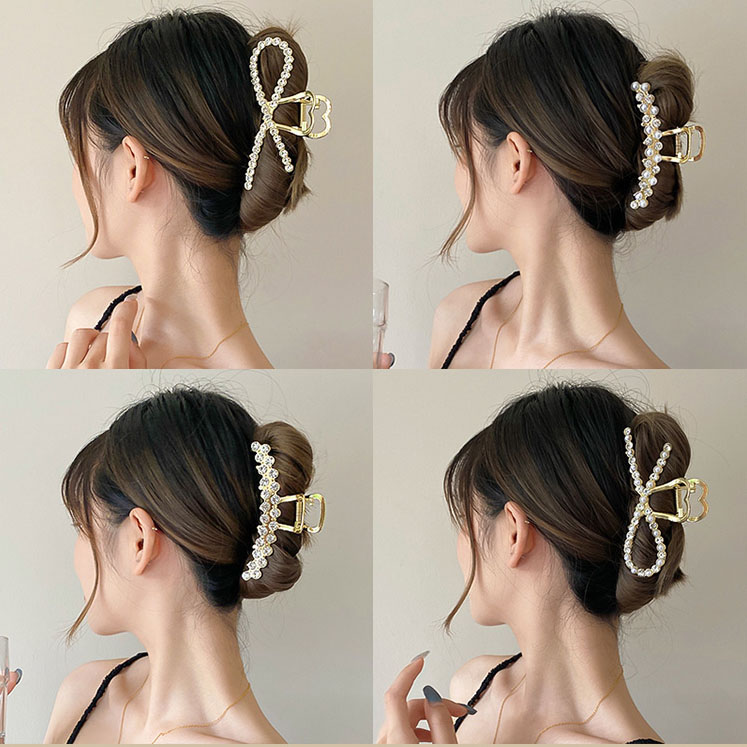 High-end jewelry in the boutique, including pearl and rhinestone clips, hairpins, shark clips, hair clips and headwear