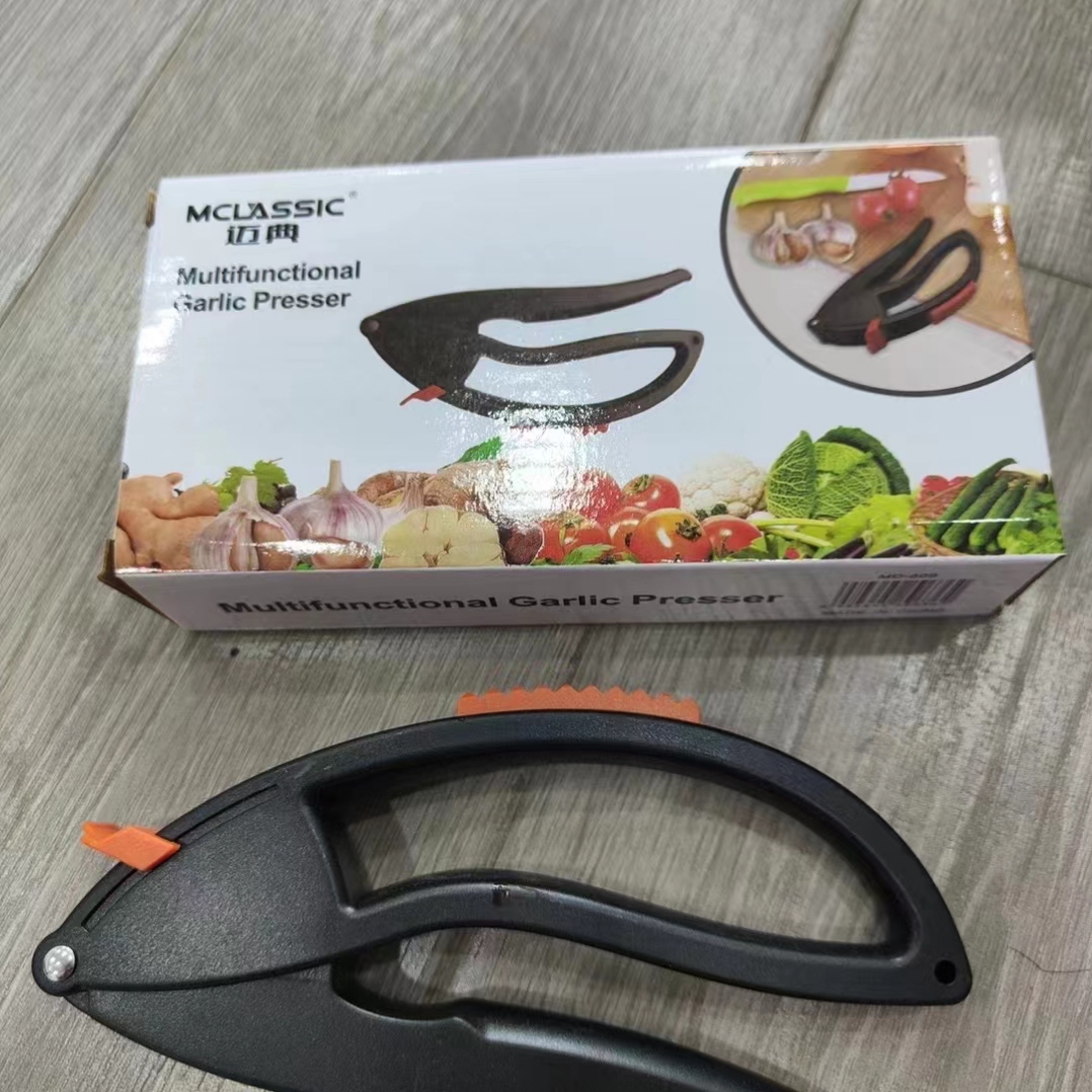 Amazon's in-stock plastic garlic puree and garlic paste applicator, multi-functional garlic press for vegetables, fruits, melons, and tender meat