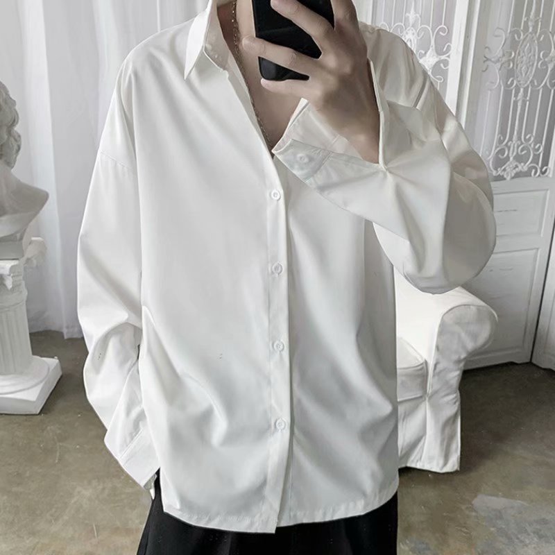 The 2021 autumn new long-sleeved shirt for men, with a flowing white top and a light mature style, is a casual and loose men's wear