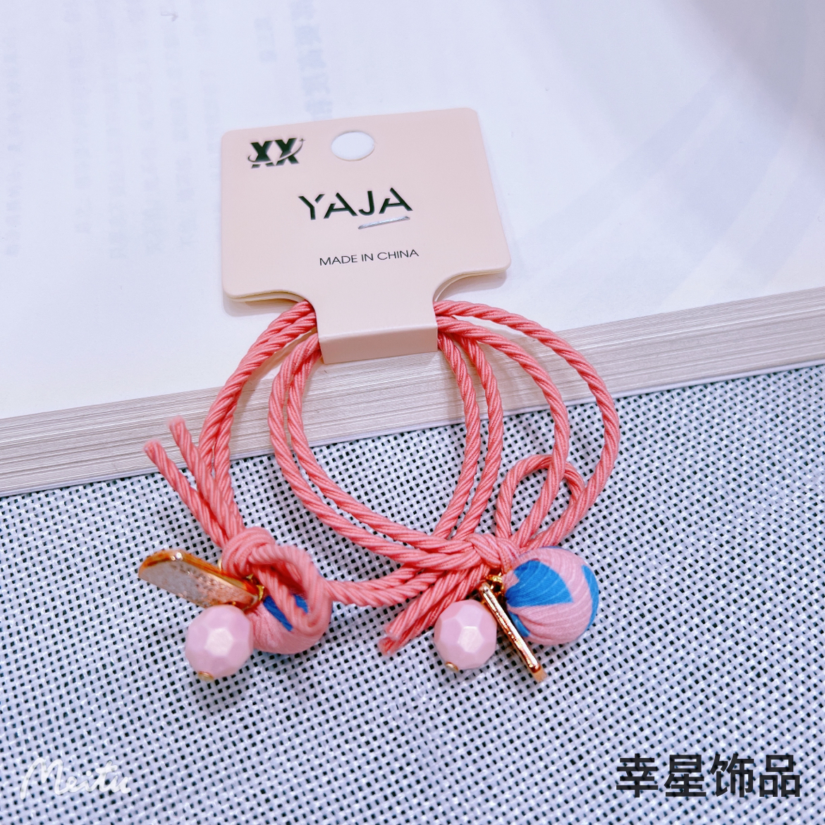 YAJA's sweet headband is a cute and simple Korean version of a girl's hair. It features a ball tied in a ponytail and a colorful hair band for children details Picture