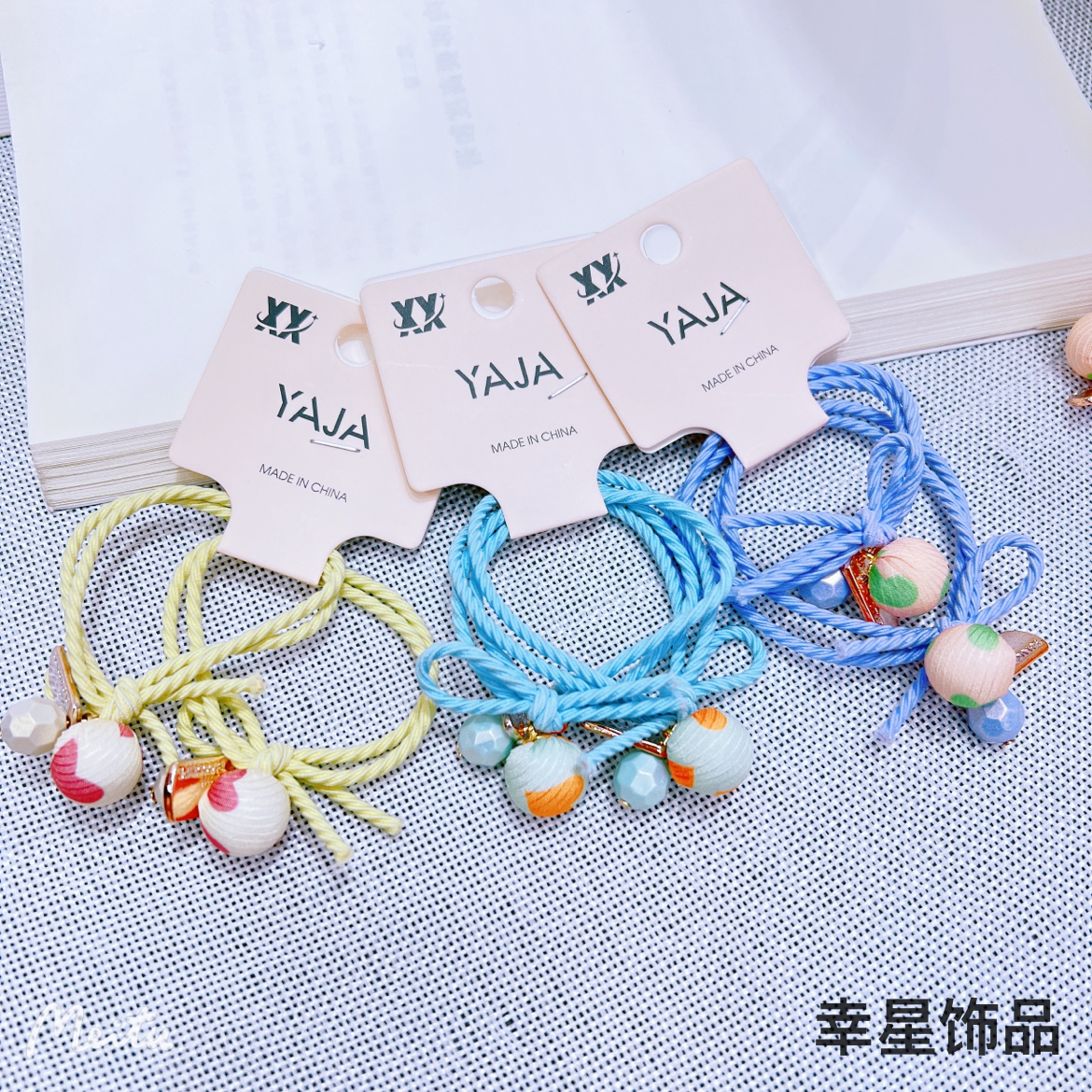 YAJA's sweet headband is a cute and simple Korean version of a girl's hair. It features a ball tied in a ponytail and a colorful hair band for children Item Picture