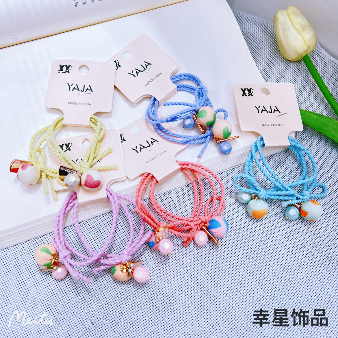 YAJA's sweet headband is a cute and simple Korean version of a girl's hair. It features a ball tied in a ponytail and a colorful hair band for children Specification image