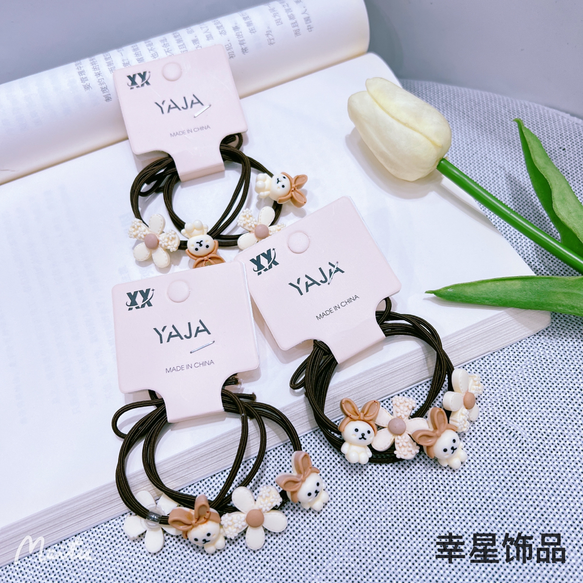 This trendy, simple and cute hair tie is in a milk coffee color with a high-end look. It features a cartoon hair tie tied in a ponytail and a rubber band hair band. It's a double-strip clip