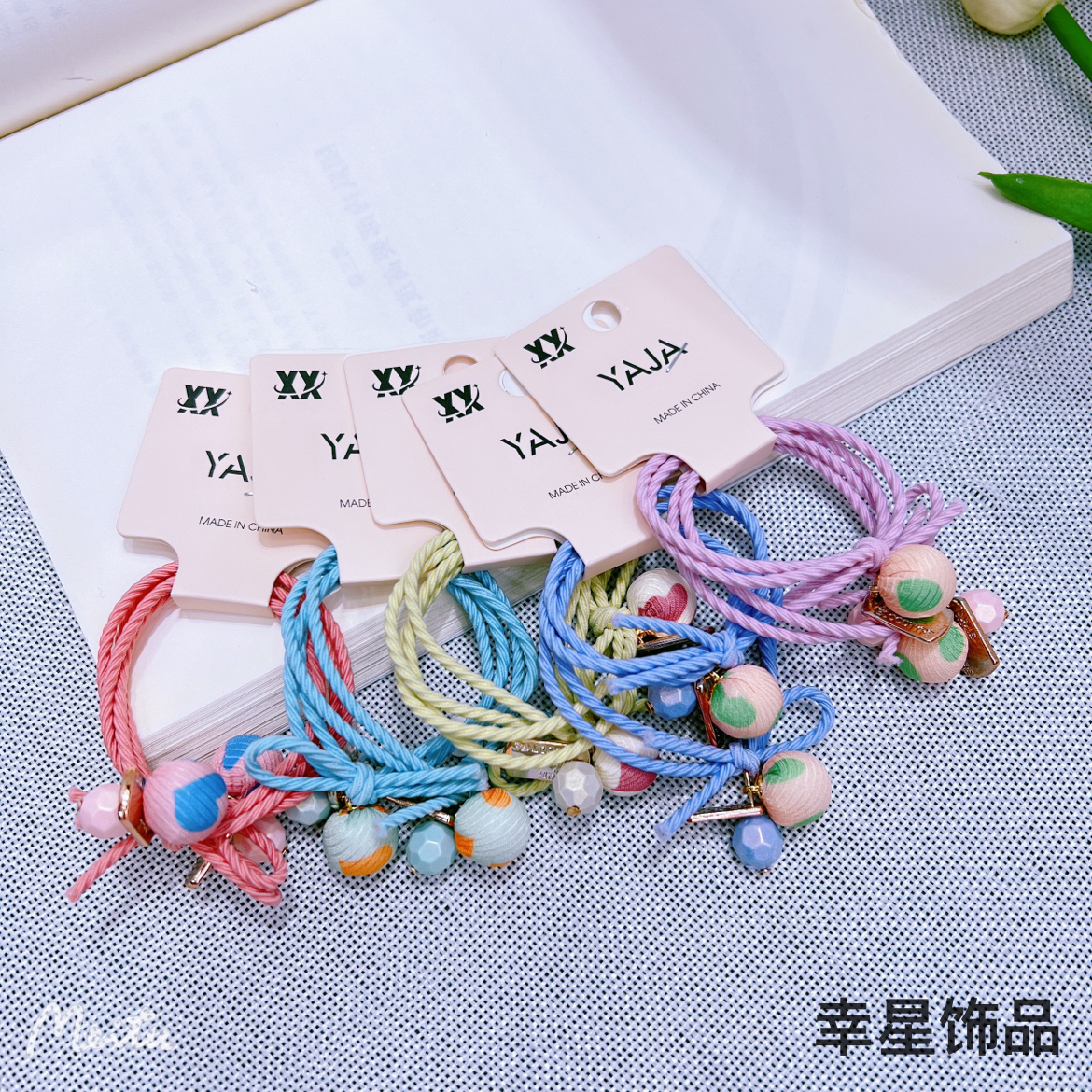 YAJA's sweet headband is a cute and simple Korean version of a girl's hair. It features a ball tied in a ponytail and a colorful hair band for children