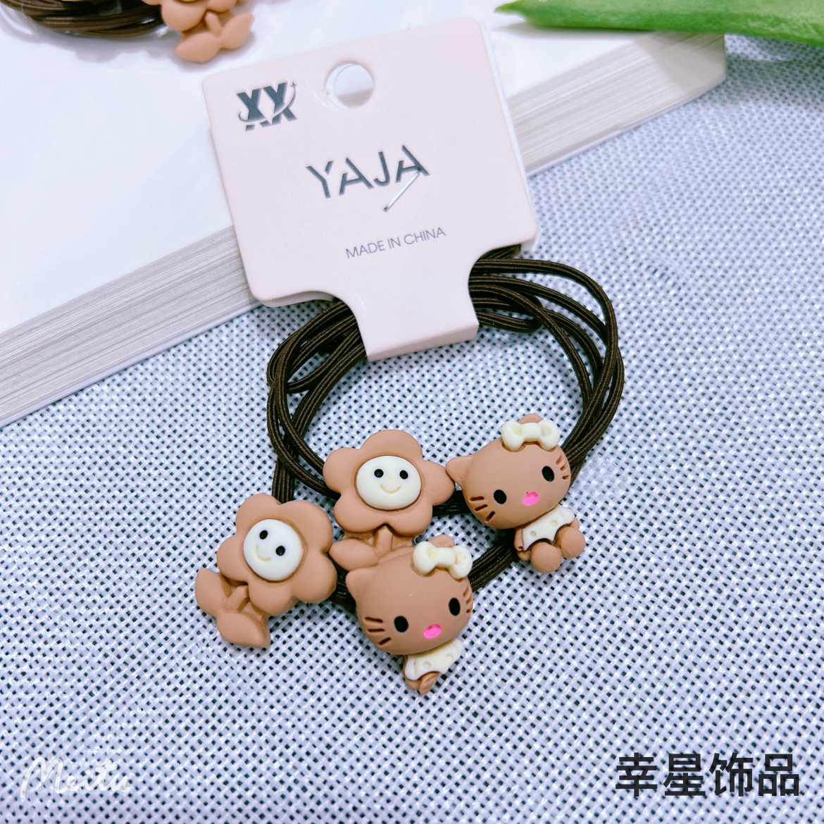 This trendy, simple and cute hair tie is in a milk coffee color with a high-end look. It features a cartoon hair tie tied in a ponytail and a rubber band hair band. It's a double-strip clip Item Picture