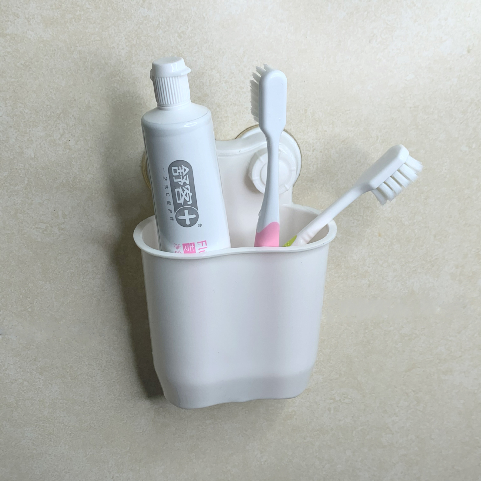 Wholesale manufacturer of bathroom toothbrush and toothpaste storage cylinders without drilling holes, bathroom storage racks, and washbasin draining storage racks