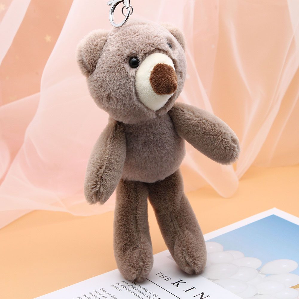 Cute plush bears, adorable couple schoolbags, keychains, pendants, plush dolls, and commemorative gifts for graduating boys and girls details Picture