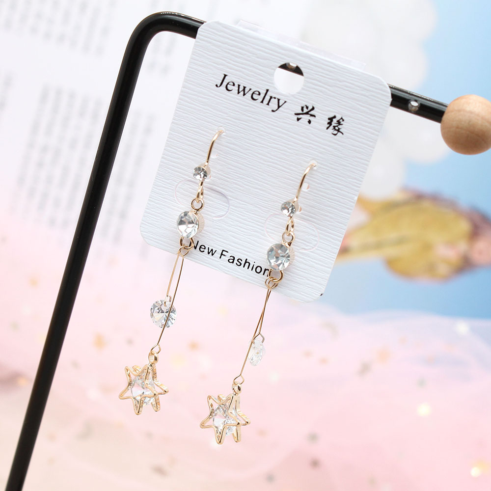 Pudding Station's stylish and elegant long tassel earrings are a versatile Korean accessory for women. They are perfect for slimming and round faces, exuding a sense of sophistication details Picture