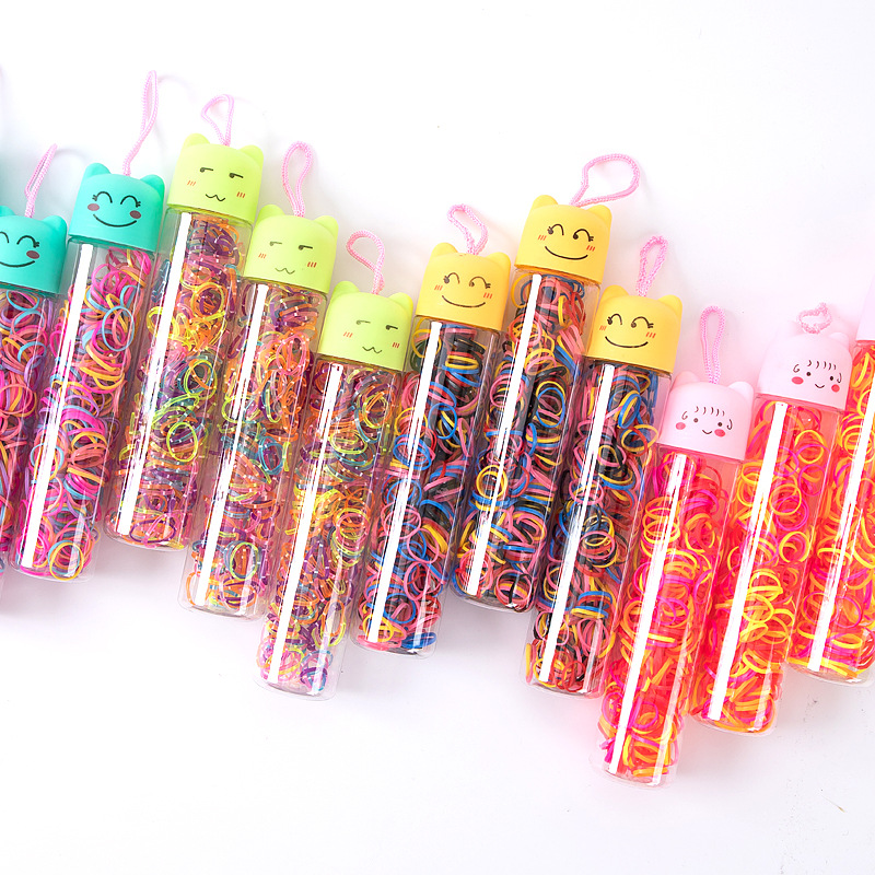 New cartoon bottle hair tie, small rubber band hair band, Yiwu product, children's transparent disposable strong pull unbreakable rubber band Specification image