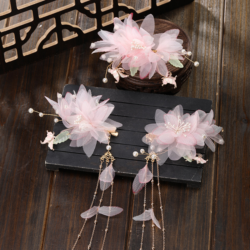 A fashionable and ethereal ancient-style female metal long tassel light pink gauze flower headpiece and a simple three-piece hair clip set