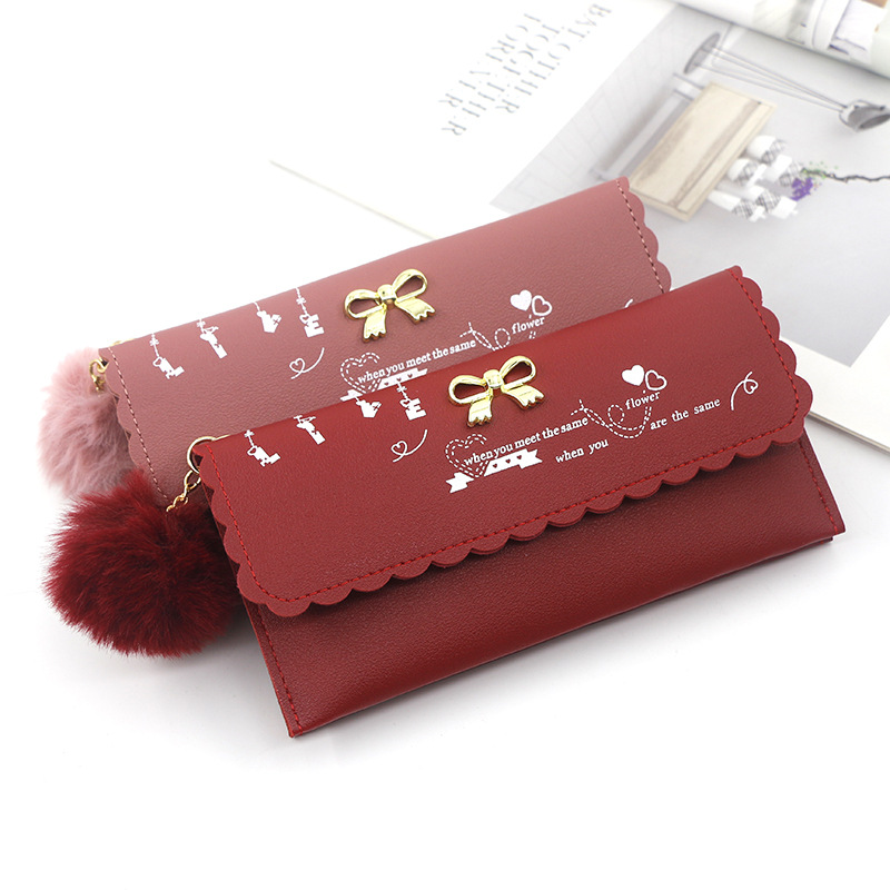 Stock Hand bag蝴蝶结女长款钱包毛球钱夹零钱包手