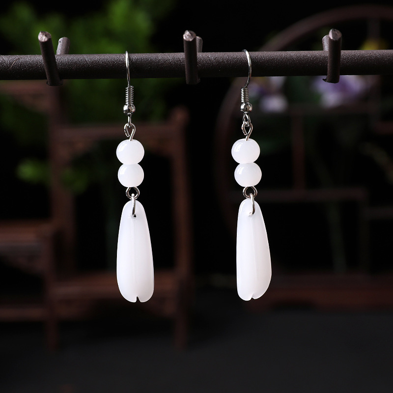 Ancient-style white jade earrings, a retro accessory for Hanfu. Petal jade bead ear hooks pendant, a classical and elegant original stone earrings details Picture