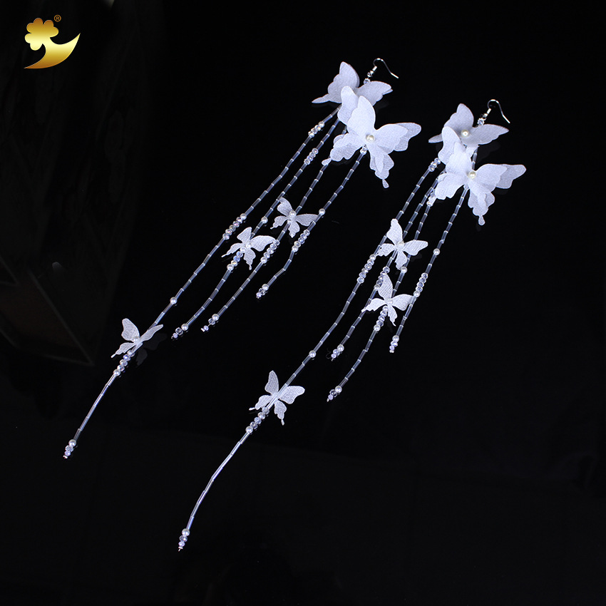 Korean-style crystal tassel earrings, fashionable and simple white butterfly jewelry, women's pure handcrafted long tassel earrings
