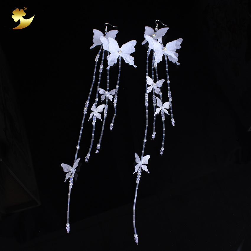Korean-style crystal tassel earrings, fashionable and simple white butterfly jewelry, women's pure handcrafted long tassel earrings details Picture