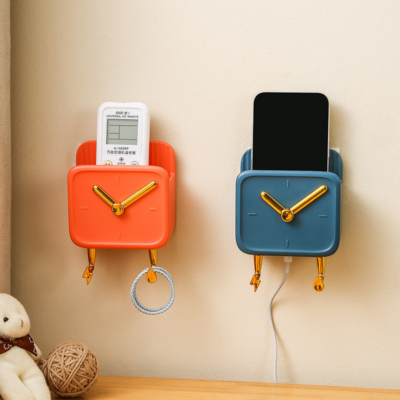 New wall-mounted mobile phone charging stand, TV, air conditioner remote control storage box, non-drilling and seamless wall-mounted storage rack Application Scenario