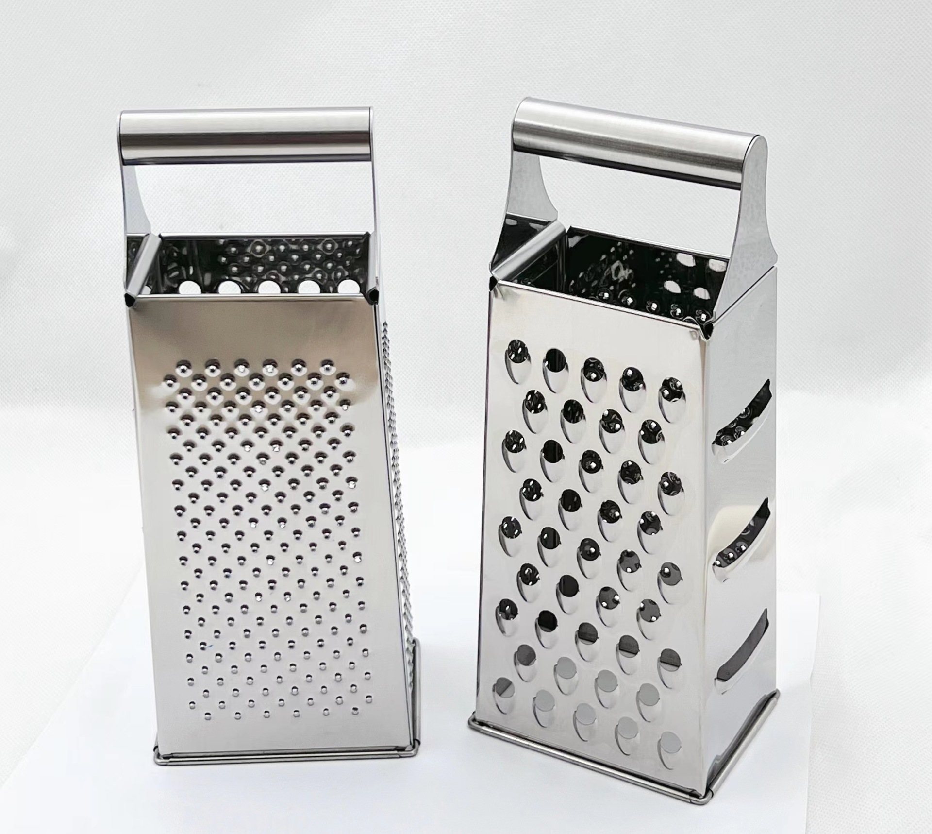 Multi - functional vegetable cutter four - side grater stainless steel cheese cheese grater radish rub fruit grater
