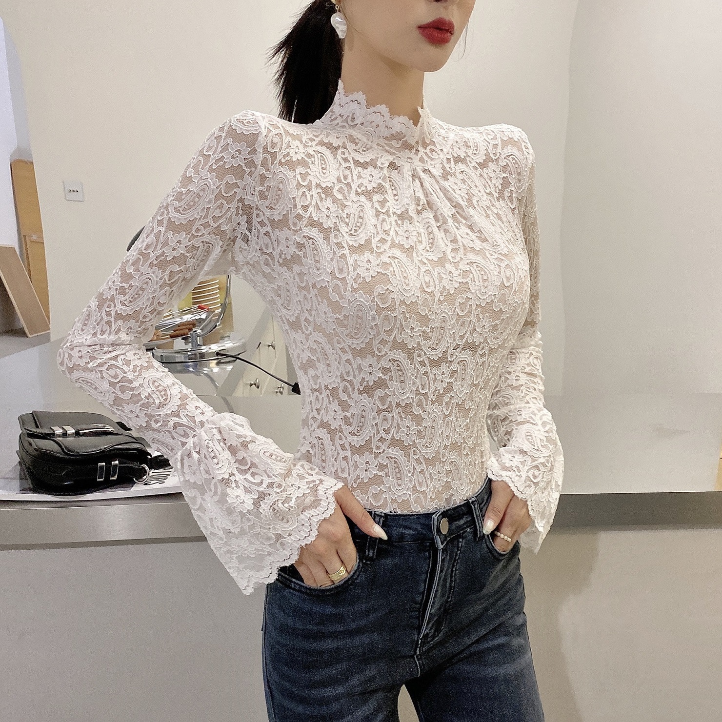 A Korean-style stylish lace top for women, paired with a new autumn and winter flared sleeve top, a long-sleeved semi-high-neck fitted base layer for women Item Picture