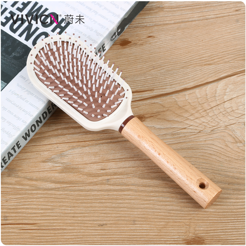 【 Weiwei 】 A portable comb for women's long hair with anti-static and curly hair, featuring a wooden handle. It's a perfect tool for combing hair Application Scenario