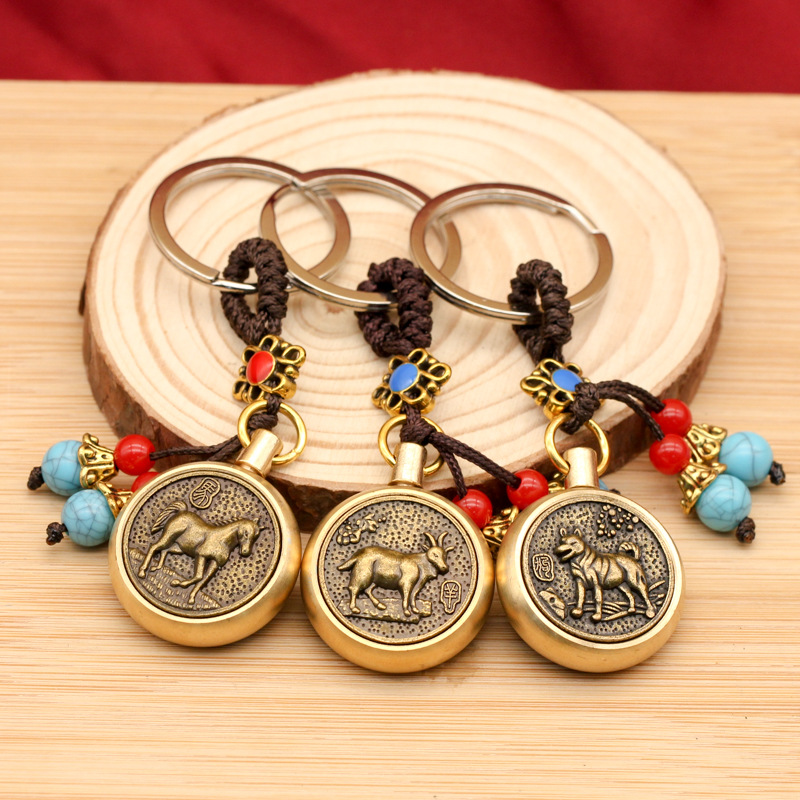 黄铜复古蓝珠绳中式生肖旋转创意钥匙扣配件小礼品小汽车挂件批发详情5